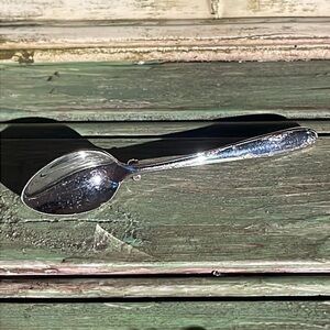 Small silver spoon brooch